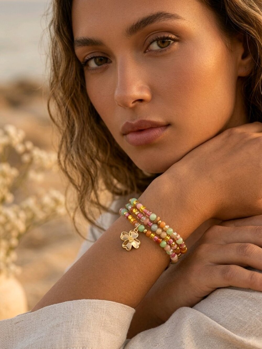 Set of 3 Mini Colorful Beaded Bracelets with an attached Flower Charm